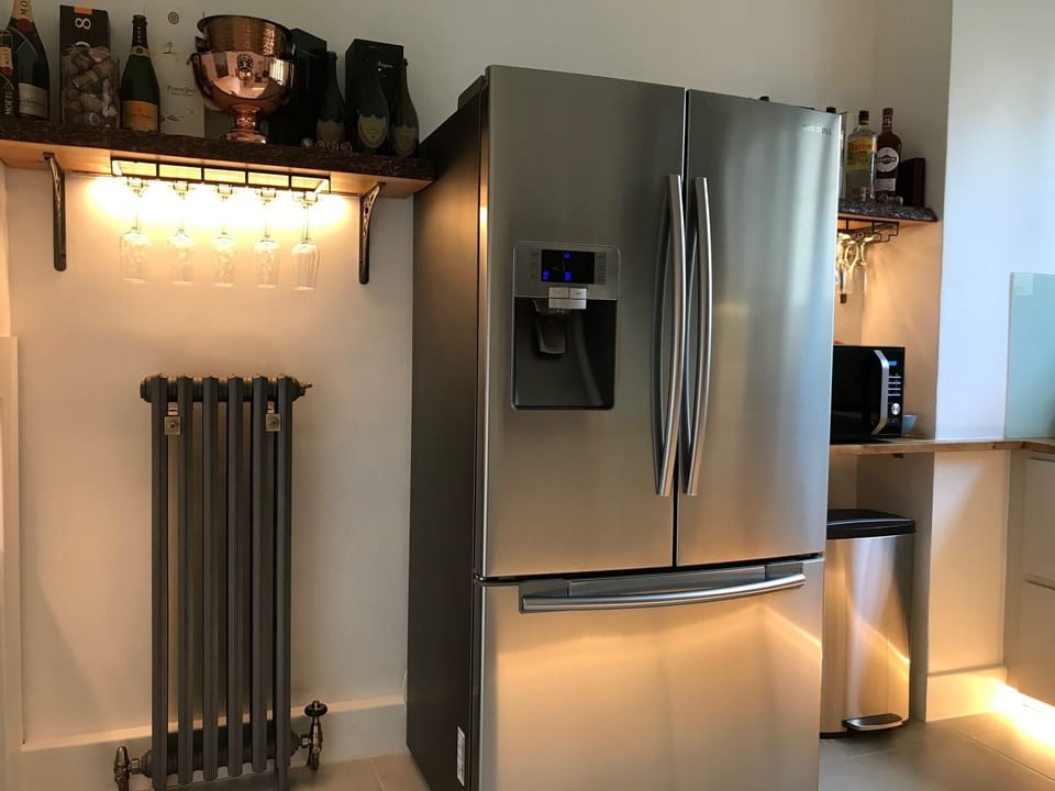 Samsung, Neff and Nespresso appliances in kitchen