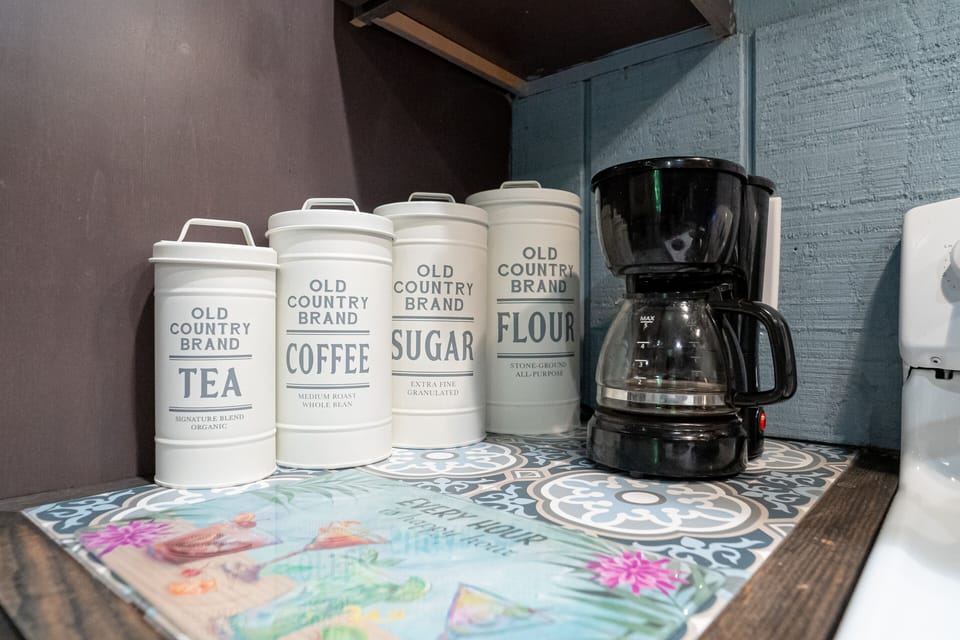 Kitchen is stocked with all your coffee & tea needs, sugar, flour, spices needs