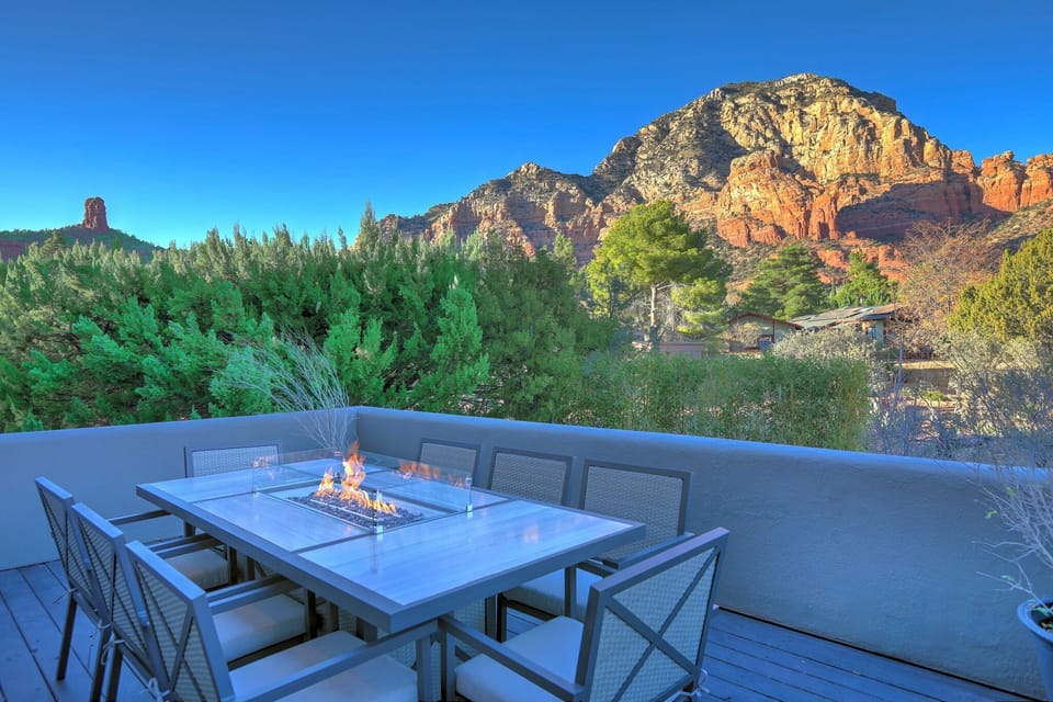 Outdoor patio with a fire dining table.