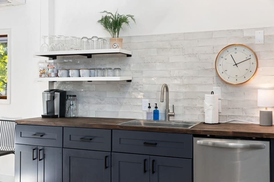 Open shelving display glassware and provide easy access for coffee and drinks