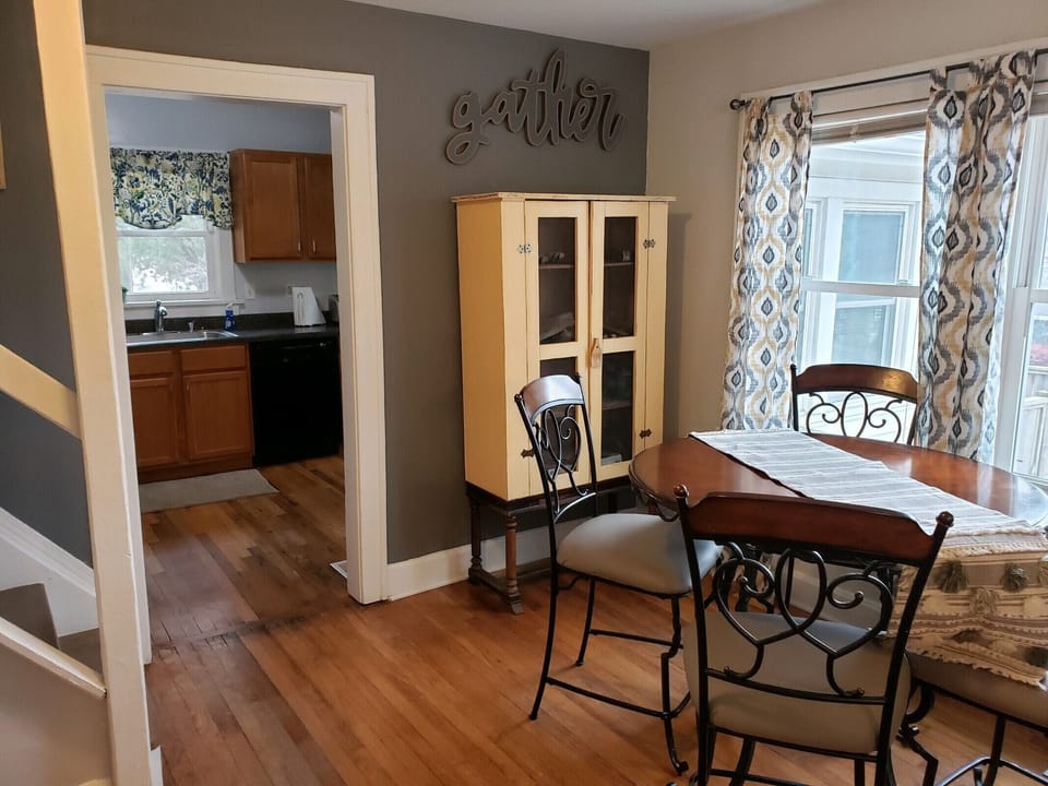 Dining area with entrance into kitchen area
