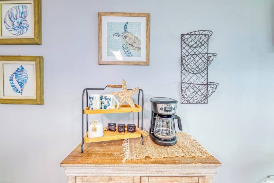 Coffee bar area, not pictured is a Keurig that is also available for use. 