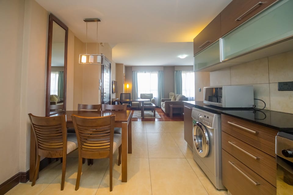 Comfort Studio | Living area | 42-inch flat-screen TV with cable channels, TV, DVD player
