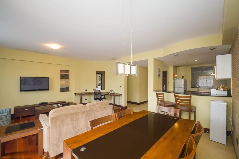 Apartment, 2 Bedrooms | Living room | 42-inch flat-screen TV with cable channels, TV, DVD player
