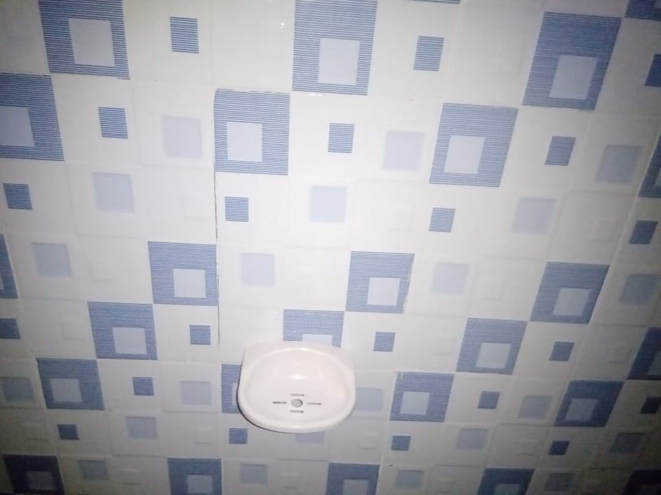 Shower, slippers, towels, soap