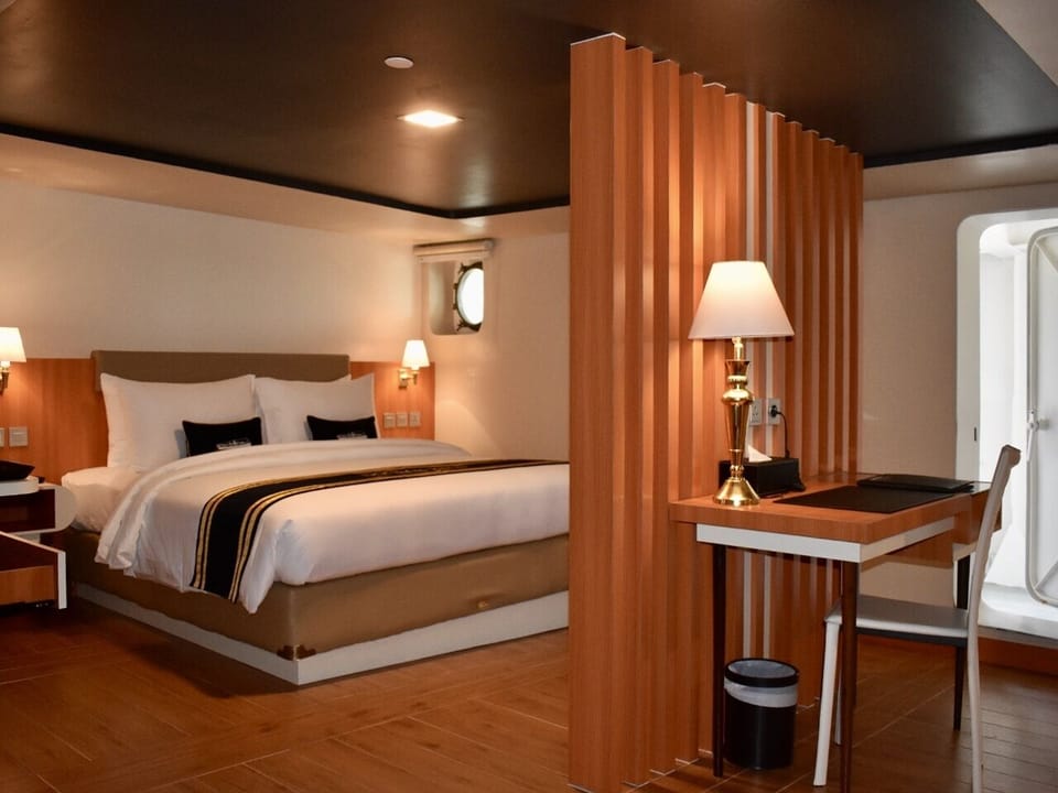 Family Balcony Suite Cabin | Minibar, in-room safe, desk, iron/ironing board (on request)
