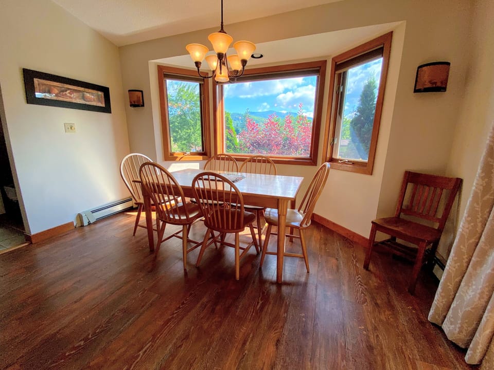The dining table has a lovely mountain view