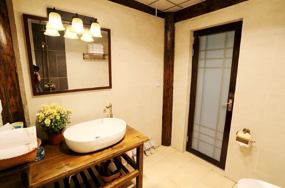 Family Room | Bathroom | Free toiletries, hair dryer, slippers, towels