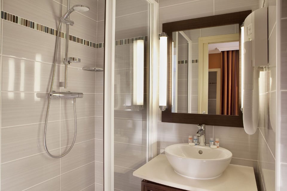 Shower, free toiletries, hair dryer, towels