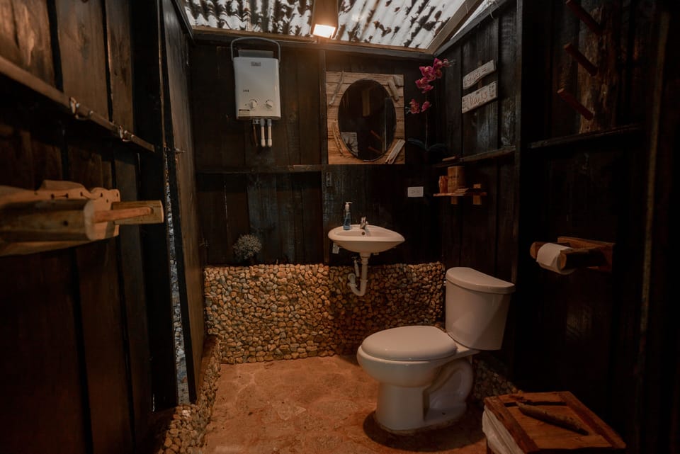 Luxury Tree House, Garden View | Bathroom | Shower, free toiletries, towels, soap