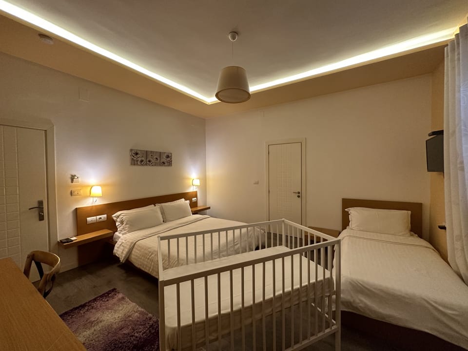 Comfort Triple Room | Premium bedding, minibar, desk, WiFi (free)