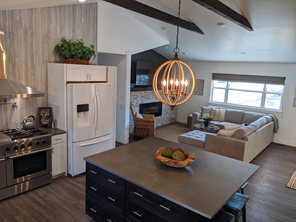 The open floor plan makes  it easy for groups to enjoy the whole living space.