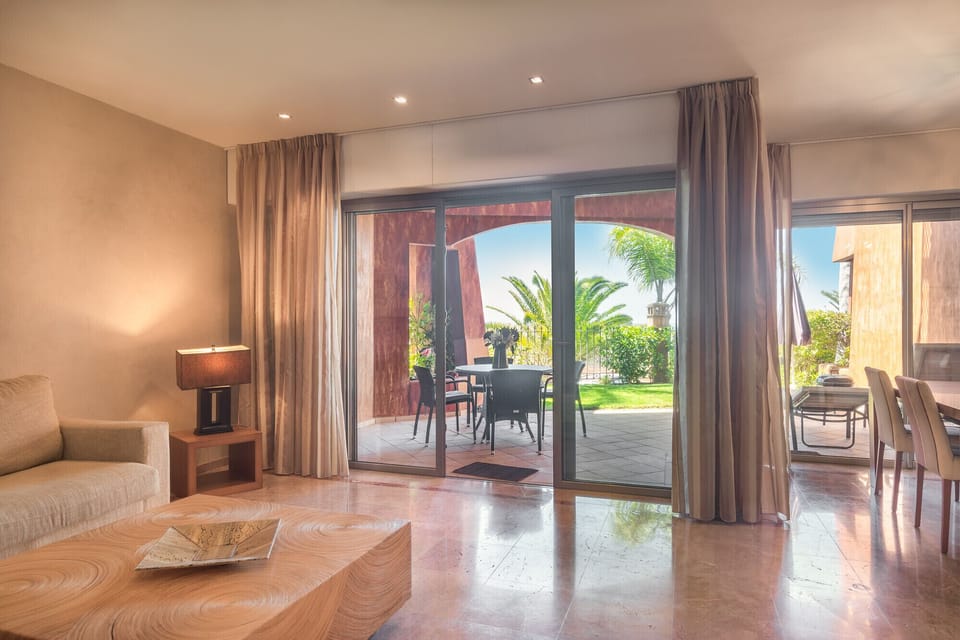 Large living room with access to the terrace and the outdoor garden