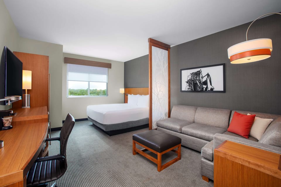 Room, 1 King Bed with Sofa bed | In-room safe, desk, laptop workspace, blackout drapes