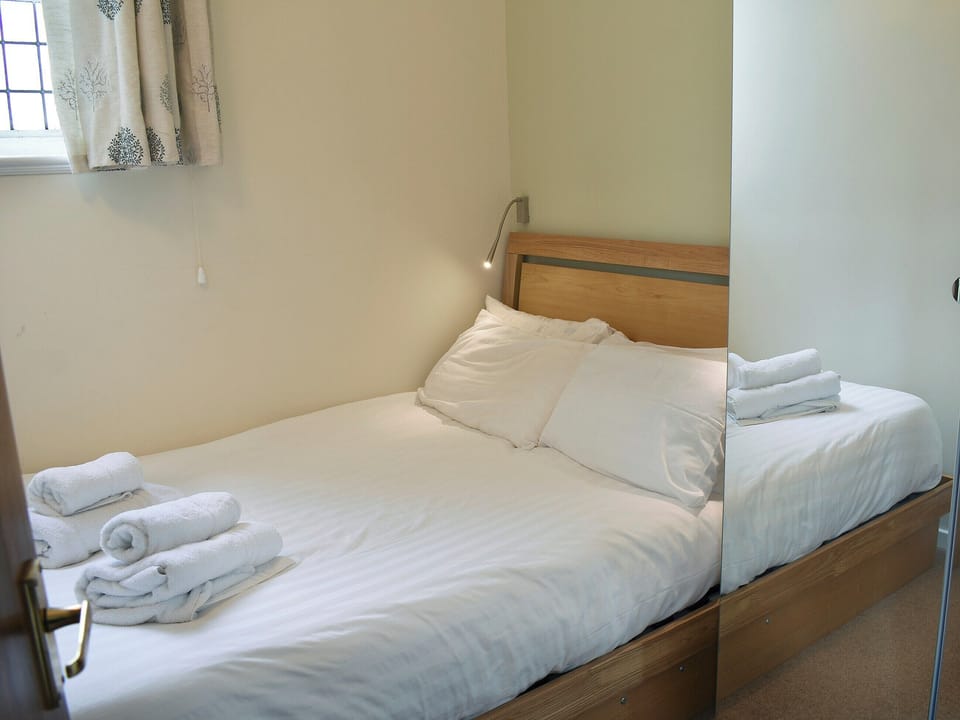 Relaxing double bedroom | Howegrain Lodge, Martindale, near Ullswater