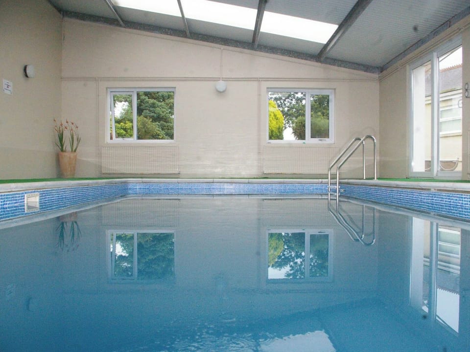 Shared indoor swimming pool | The Carthouse, The Orchard, The Farmhouse - Morlogws Farm Holiday Cottages, Capel Iwan, near Newcastle Emlyn