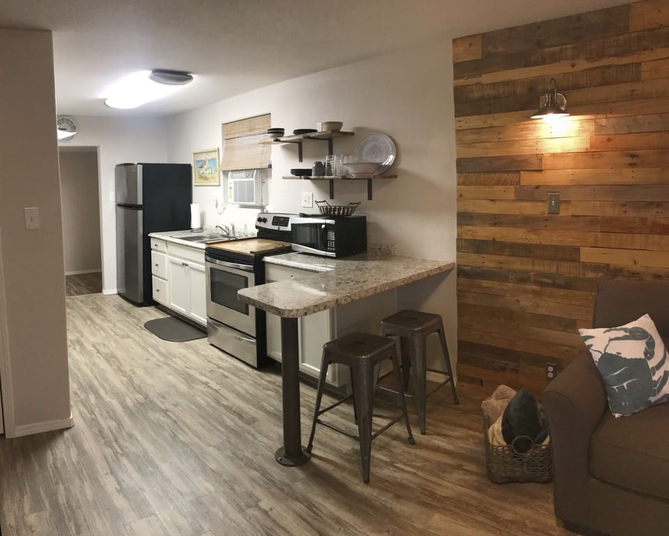 Fully stocked kitchen with refrigerator with ice maker