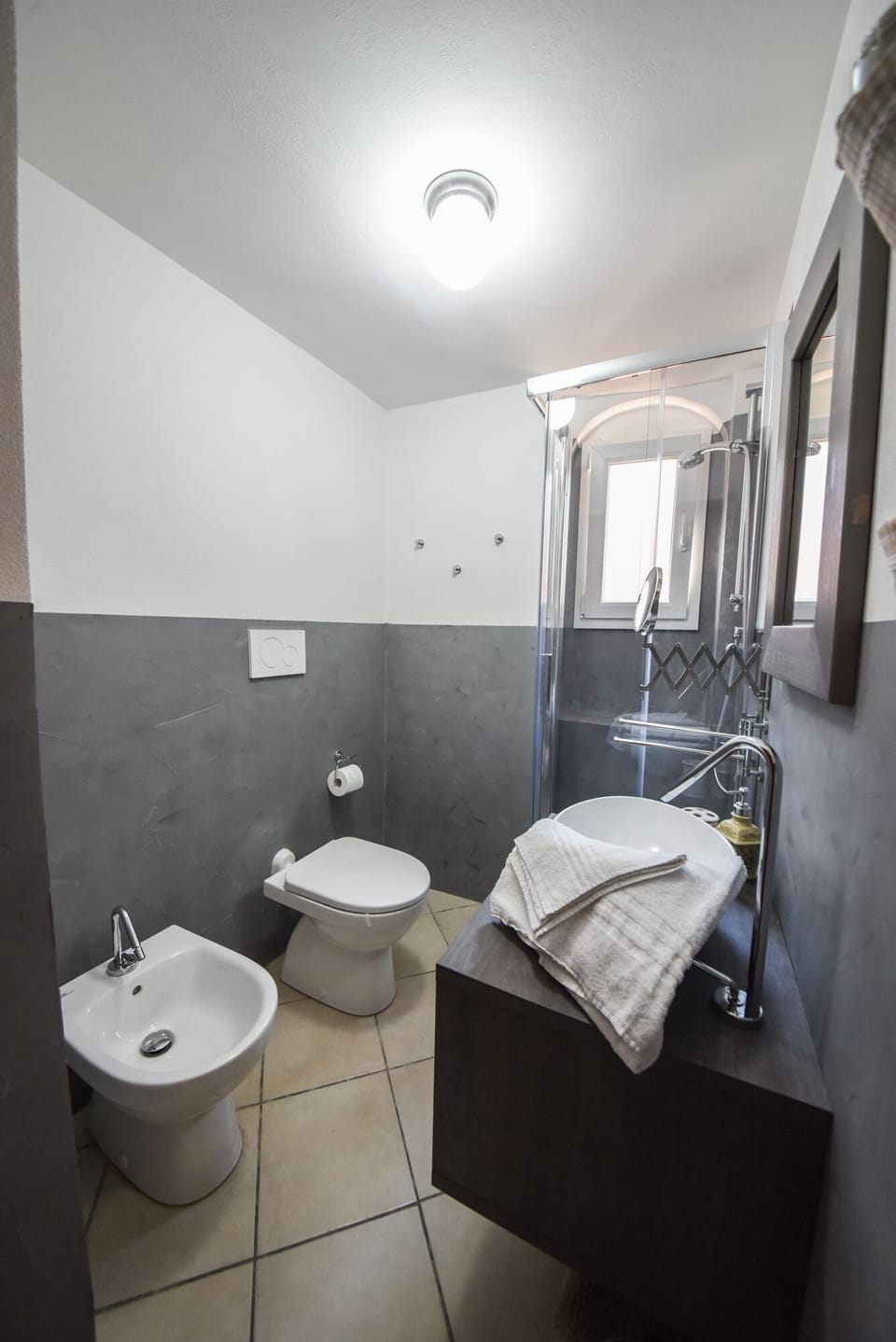 Apartment, 1 Bedroom (In Famiglia) | Bathroom | Shower, free toiletries, hair dryer, bidet