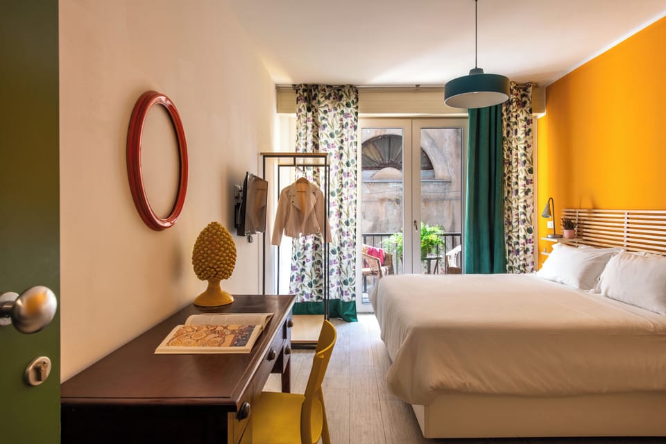 Economy Double Room, Private Bathroom | Down comforters, minibar, individually decorated, individually furnished