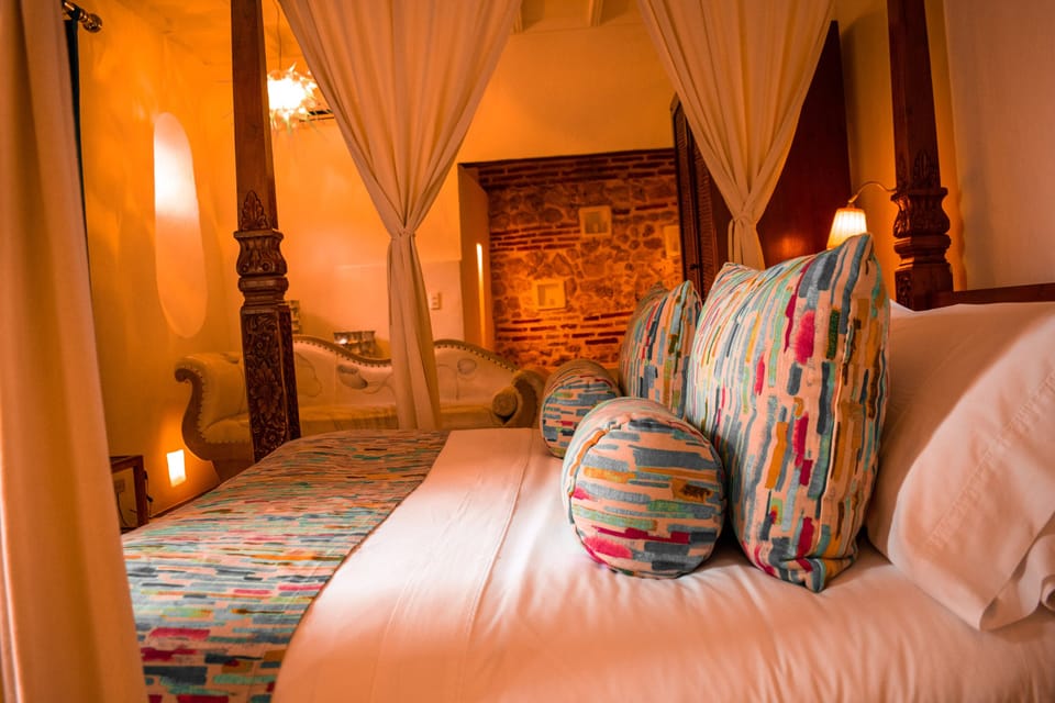 Premium bedding, down comforters, minibar, in-room safe