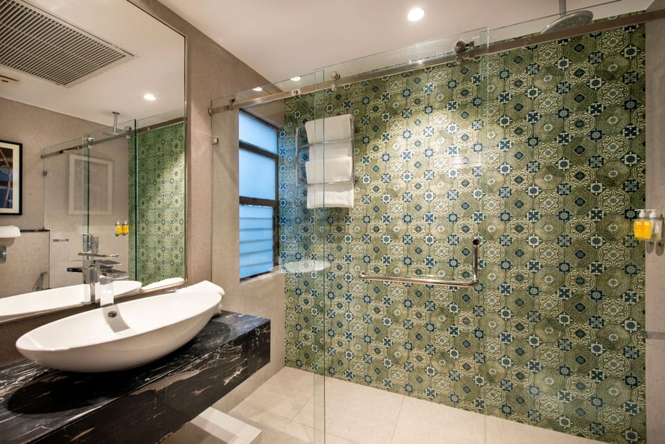 Shower, free toiletries, hair dryer, slippers