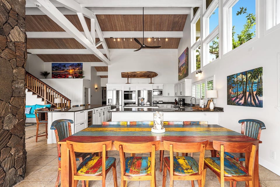Share meals and moments around a vibrant table, just steps from the open kitchen.