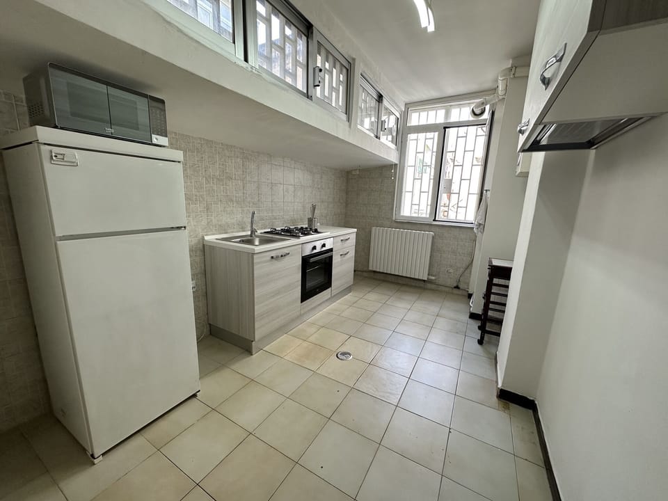 Deluxe Apartment | Private kitchen | Full-size fridge, oven, stovetop, coffee grinder