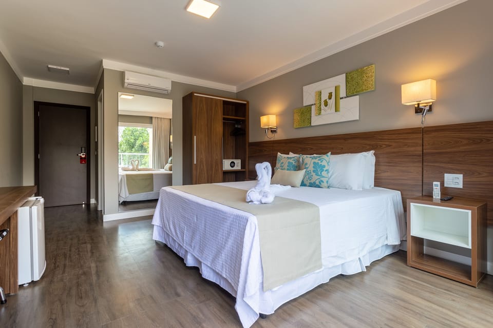 Superior Double Room, Garden View | Minibar, in-room safe, desk, laptop workspace