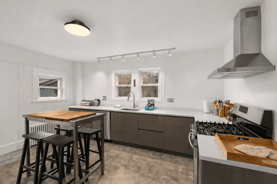 Fully equipped kitchen featuring modern appliances.