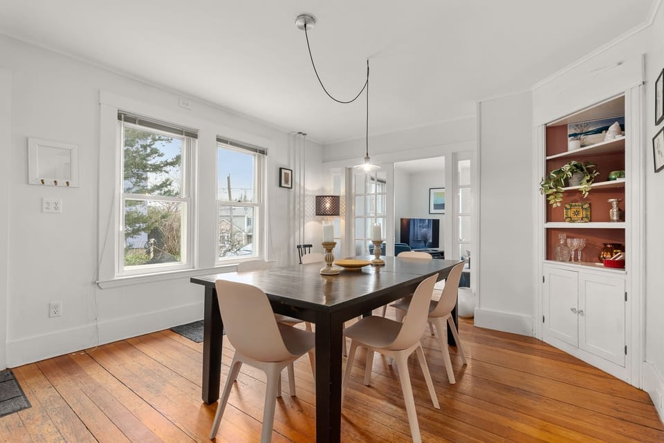 The formal dining room with outdoor views.