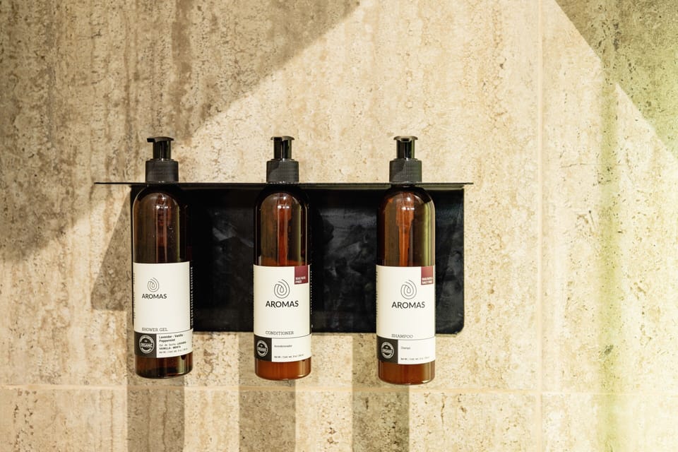 Shower, rainfall showerhead, towels
