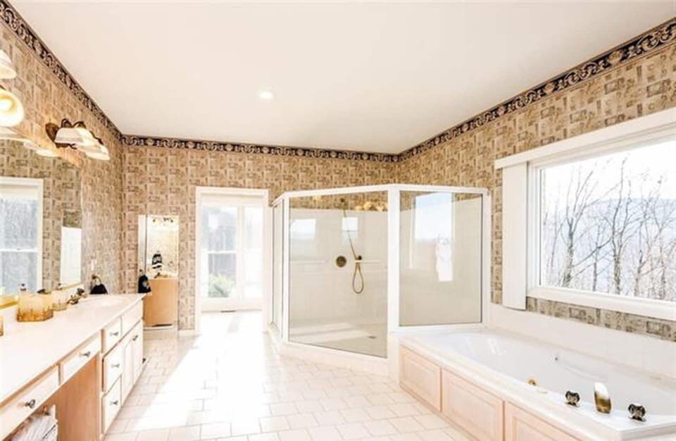 Huge master bathroom en-suite.  Walk in shower with handicap bar.