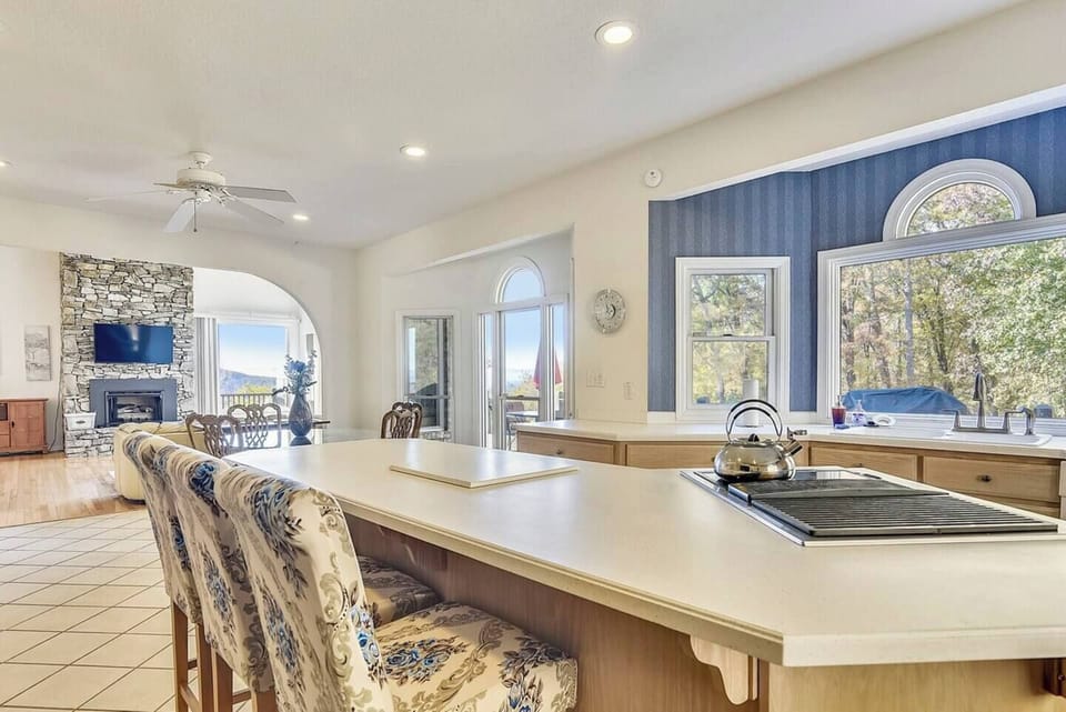 Fully stocked kitchen.  Table seats 4-6, breakfast bar seats 3. 