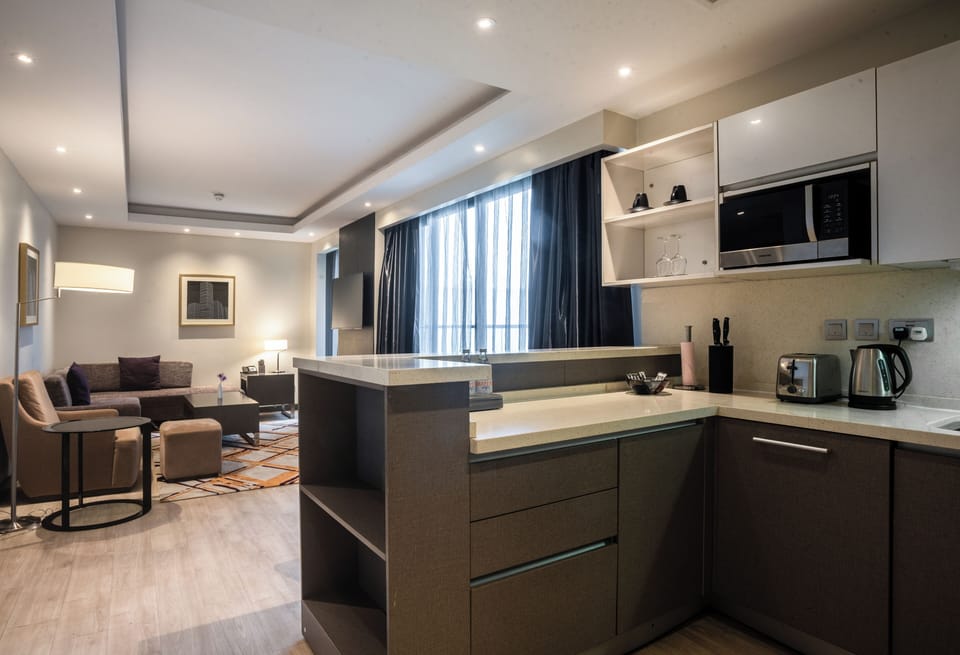 Executive Suite Room | Living area | Flat-screen TV