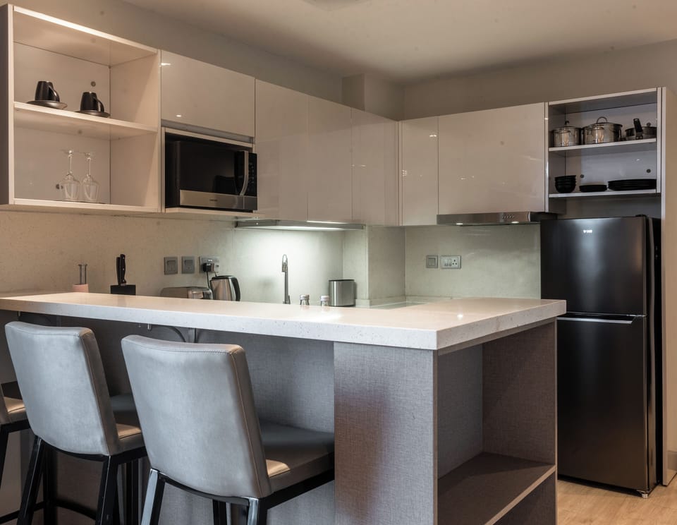 Executive Suite Room | Private kitchenette | Eco-friendly cleaning products