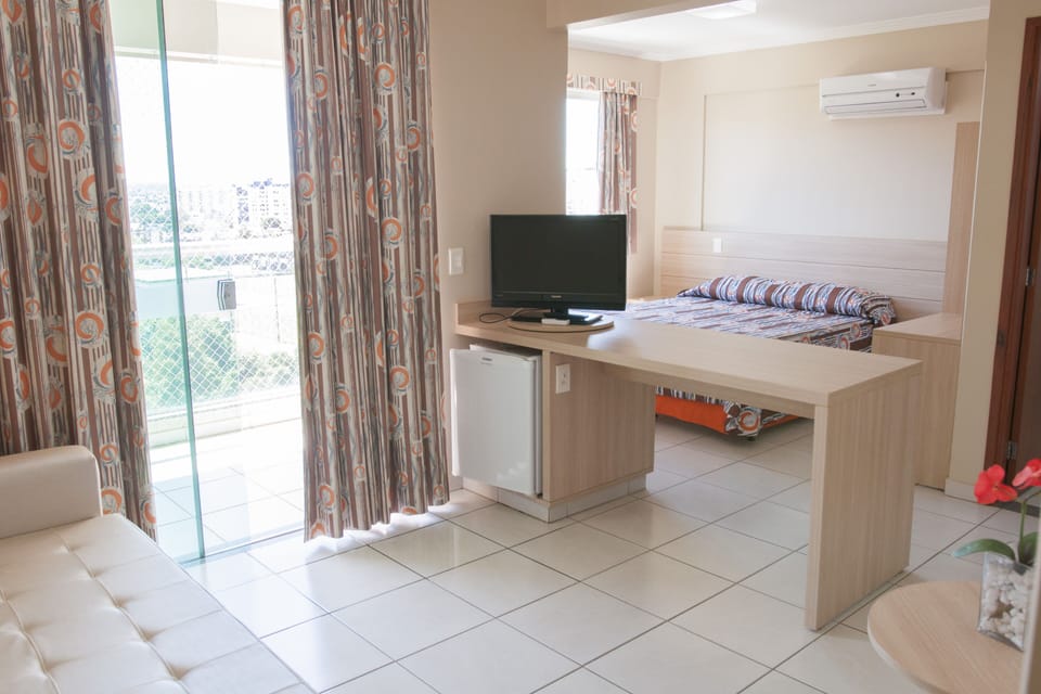 Suite Simples | Minibar, WiFi, bed sheets