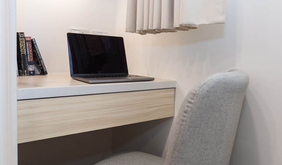 Bedroom 1 (Ensuite): 
• Queen Bed 
• Desk & Chair
• Closet
• Private Bathroom
