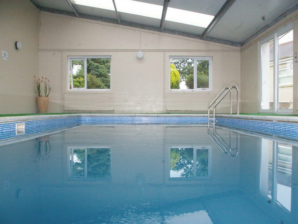 Shared indoor swimming pool | The Carthouse, The Orchard, The Farmhouse - Morlogws Farm Holiday Cottages, Capel Iwan, near Newcastle Emlyn