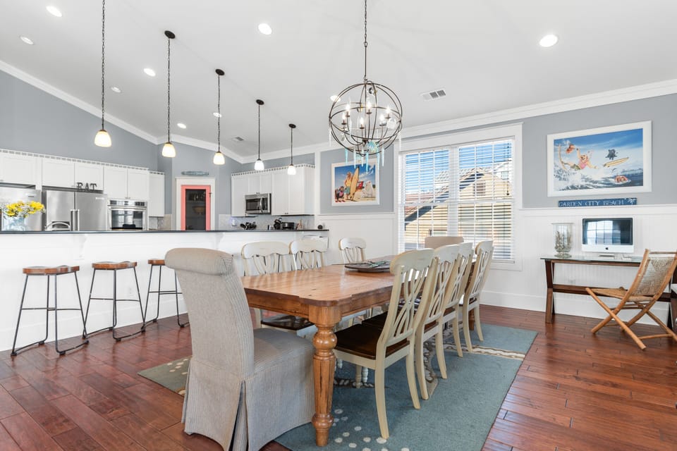 Gather around your spacious dining table for memorable meals while the chef works in your fully-equipped kitchen.
