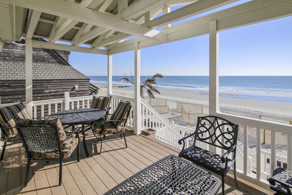Your private oceanfront terrace offers stunning panoramic sea views where you can savor morning coffee watching waves.