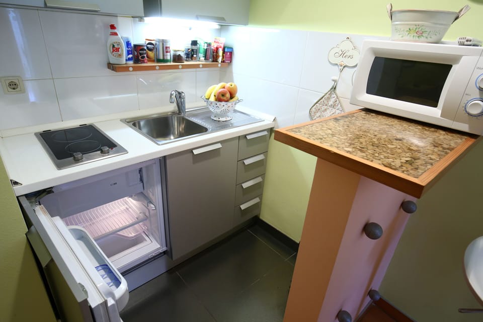 Apartment, 2 Bedrooms, Balcony | Private kitchen | Fridge, microwave, stovetop, coffee/tea maker