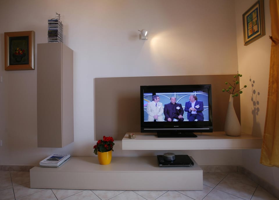 City Apartment, 1 Bedroom, Balcony | Television