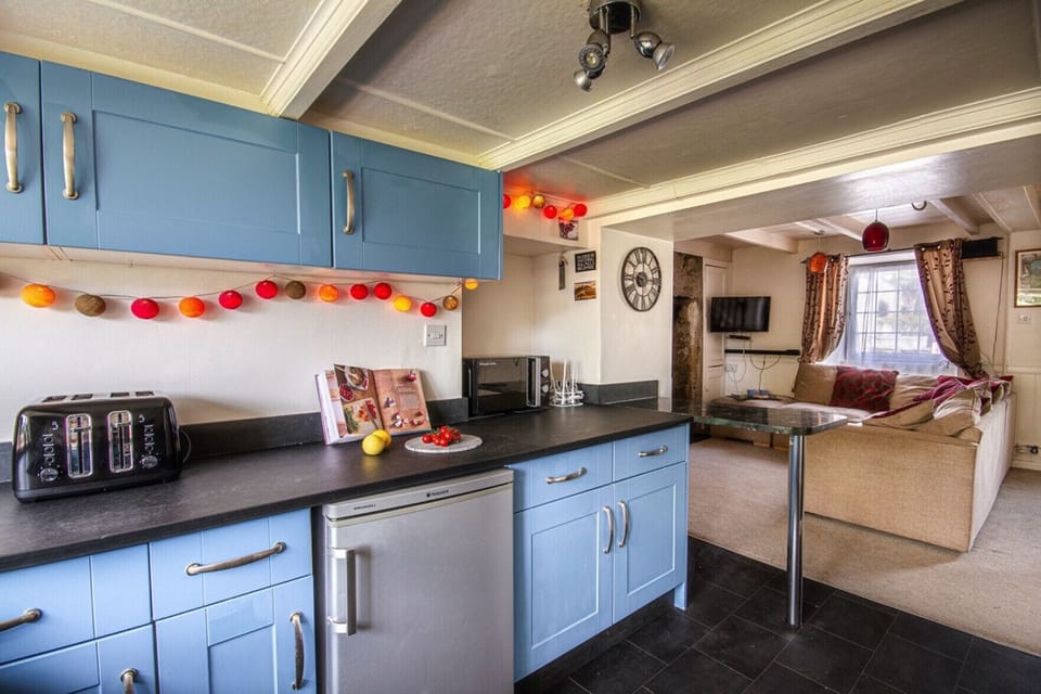 Kitchen and one of the lounges open plan 