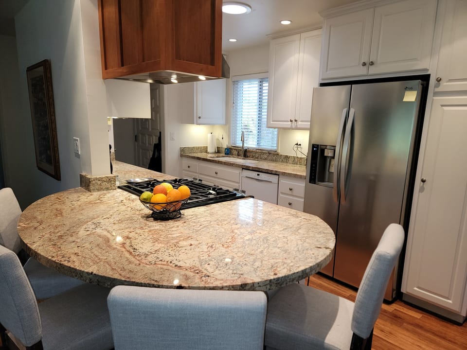 The bar area is perfect for casual dining and is the focal and social center. 