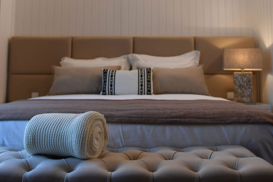 Junior Suite, Terrace, Garden View | Minibar, in-room safe, desk, laptop workspace