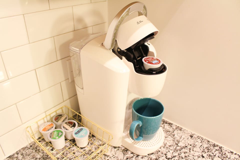 Keurig machine with complimentary coffee.
