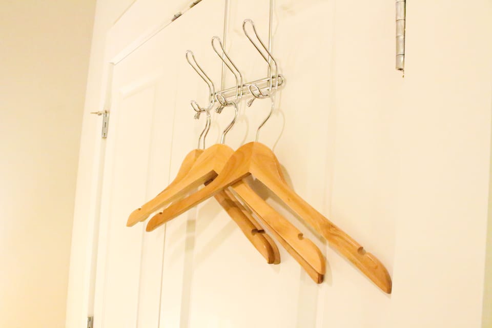 We provide wooden hangers to help our guests keep their clothes presentable