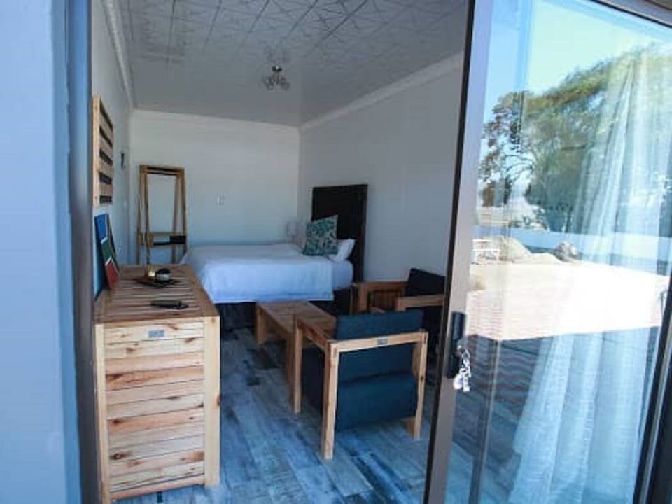 Deluxe Double Room (South Africa) | Blackout drapes, iron/ironing board, WiFi (free), bed sheets