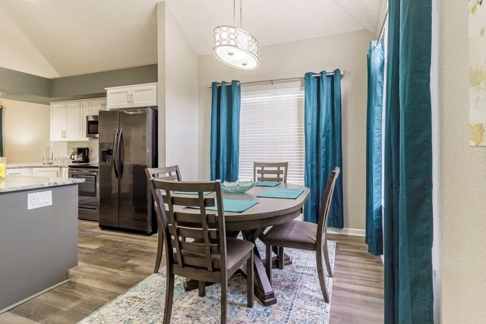 Kitchen overlooks Dining and Living Rooms.