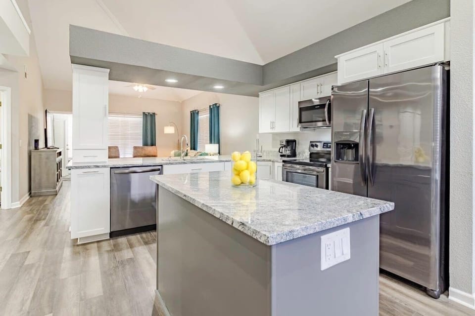 Kitchen equipped with full size Appliances.